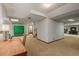 Finished basement hallway showing access to other rooms and areas at 6148 W Pacific Cir, Lakewood, CO 80227