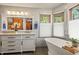 Modern bathroom with double vanity and a freestanding soaking tub at 6148 W Pacific Cir, Lakewood, CO 80227