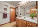 Basement bathroom with vanity, toilet and shower/tub combo at 6148 W Pacific Cir, Lakewood, CO 80227