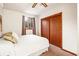 Basement bedroom with double closet and window at 6148 W Pacific Cir, Lakewood, CO 80227