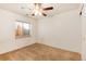 Cozy bedroom with neutral carpeting, ceiling fan, and ample natural light creates a comfortable and inviting atmosphere at 6313 E 130Th Ave, Thornton, CO 80602