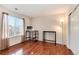 Bright bedroom featuring hardwood floors, natural light, neutral paint, and versatile floor plan for flexible arrangement at 6313 E 130Th Ave, Thornton, CO 80602