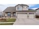 Charming two-story home with a three-car garage and neutral color scheme at 6313 E 130Th Ave, Thornton, CO 80602