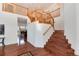 Spacious foyer with hardwood floors and staircase leading to upper level at 6313 E 130Th Ave, Thornton, CO 80602