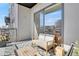 Inviting condo balcony with comfortable seating and views of the building at 1300 N Ogden St # 304, Denver, CO 80218