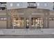 Commercial building entrance with large windows and glass door, located at 1300 at 1300 N Ogden St # 304, Denver, CO 80218