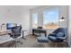 Home office with modern furnishings, natural light, and comfortable seating at 1300 N Ogden St # 304, Denver, CO 80218