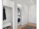 Laundry room with a stacked washer and dryer, plus extra closet space at 1300 N Ogden St # 304, Denver, CO 80218
