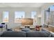 Inviting living room featuring hardwood floors and neighborhood views at 1300 N Ogden St # 304, Denver, CO 80218