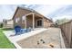 Exterior view of a backyard with a patio and an area perfect for games at 1358 14Th Ave, Longmont, CO 80501