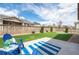 Expansive backyard featuring a manicured lawn and a cozy patio area perfect for outdoor gatherings at 1358 14Th Ave, Longmont, CO 80501