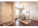 Formal dining room with a decorative chandelier, wood floors, and an abundance of natural light at 1358 14Th Ave, Longmont, CO 80501