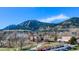 Aerial view showcasing mountain backdrop and landscape at 1077 Canyon Blvd # 403, Boulder, CO 80302