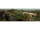 Aerial view of a residential area showing houses and a tree-lined street at 1077 Canyon Blvd # 403, Boulder, CO 80302