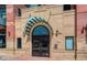 Elegant building entrance with a grand porte-cochère at 1077 Canyon Blvd # 403, Boulder, CO 80302