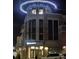 Modern building exterior at night with decorative lighting at 1077 Canyon Blvd # 403, Boulder, CO 80302