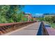 Scenic footbridge offering views of the cityscape and lush greenery at 1077 Canyon Blvd # 403, Boulder, CO 80302