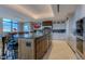 Modern kitchen with expansive island and mountain views at 1077 Canyon Blvd # 403, Boulder, CO 80302