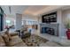 Open living area with a large TV and cozy fireplace at 1077 Canyon Blvd # 403, Boulder, CO 80302