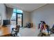 Home office with desk, chair, exercise equipment, and access to a balcony at 1077 Canyon Blvd # 403, Boulder, CO 80302