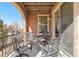 Covered patio with seating area, perfect for outdoor entertaining, with string lights overhead at 9340 Sori Ln, Highlands Ranch, CO 80126