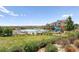 Community pool with large pool, seating, and slide at 6103 S Millbrook Ct, Aurora, CO 80016