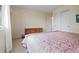 Bright bedroom featuring neutral walls, a window and comfortable furnishings at 6895 S Norfolk St, Foxfield, CO 80016