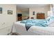 Bedroom with a quilt on the bed and a television at 6895 S Norfolk St, Foxfield, CO 80016