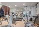 Home gym equipped with modern exercise equipment and ample space for workouts at 6895 S Norfolk St, Foxfield, CO 80016