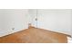 Clean bedroom features cork floors and neutral walls, and a classic trim package at 810 Adams St, Denver, CO 80206