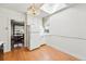 Bright view of kitchen showing white appliances with an adjacent dining area at 810 Adams St, Denver, CO 80206
