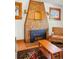 Charming living room showcasing a tile fireplace and hardwood floors at 810 Adams St, Denver, CO 80206