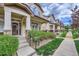 Attractive townhomes with well-maintained lawns and inviting front entrances at 1436 Turnberry Dr, Castle Rock, CO 80104