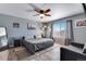 Spacious main bedroom featuring modern decor, and a large window offering plenty of natural light at 17035 E 102Nd Pl, Commerce City, CO 80022