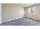 Comfortable bedroom with plush carpeting, neutral walls and ample natural lighting at 4160 E 115Th Pl, Thornton, CO 80233
