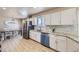 Bright kitchen featuring stainless steel appliances, granite countertops, and modern backsplash at 4160 E 115Th Pl, Thornton, CO 80233