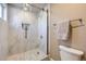 Newly remodeled bathroom with tiled shower, glass door, and modern fixtures at 4160 E 115Th Pl, Thornton, CO 80233