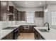 Close-up of the modern kitchen, highlighting the sleek appliances and stylish countertops at 16605 Peak St, Broomfield, CO 80023