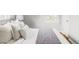 Bedroom featuring a cozy bed and large windows at 2970 Leyden St, Denver, CO 80207