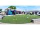 Commercial space with synthetic turf, picnic tables, and a soft serve ice cream shop at 2970 Leyden St, Denver, CO 80207