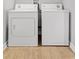Laundry room featuring a side-by-side washer and dryer at 2970 Leyden St, Denver, CO 80207
