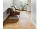 Stylish living room featuring hardwood floors, modern furniture, and an elegant area rug at 2970 Leyden St, Denver, CO 80207