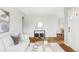 Comfortable living room with modern decor and a view into the dining area at 2970 Leyden St, Denver, CO 80207