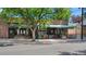 Oblio's Pizzeria Est. 1996 featuring large windows, outdoor seating, and a brick facade along a neighborhood street at 2970 Leyden St, Denver, CO 80207