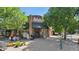 Charming Little Bird retail shop with a brick facade, awning, and sidewalk display creating an inviting shopping experience at 2970 Leyden St, Denver, CO 80207