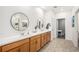 Double vanity bathroom with modern fixtures and ample counter space at 3522 N Buchanan Way, Aurora, CO 80019