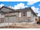 Charming single-Gathering home featuring stone accents, a two-car garage, and a well-maintained landscape at 3522 N Buchanan Way, Aurora, CO 80019