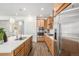 Well-equipped kitchen featuring stainless steel appliances and ample counter space at 3522 N Buchanan Way, Aurora, CO 80019