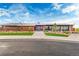 Stunning clubhouse exterior featuring a beautifully landscaped entrance and modern architectural design at 10771 N Montane Dr, Broomfield, CO 80021