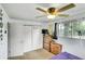 Bedroom with carpet flooring, a dresser, a closet, and natural light at 5175-5185 Simms Pl, Wheat Ridge, CO 80033